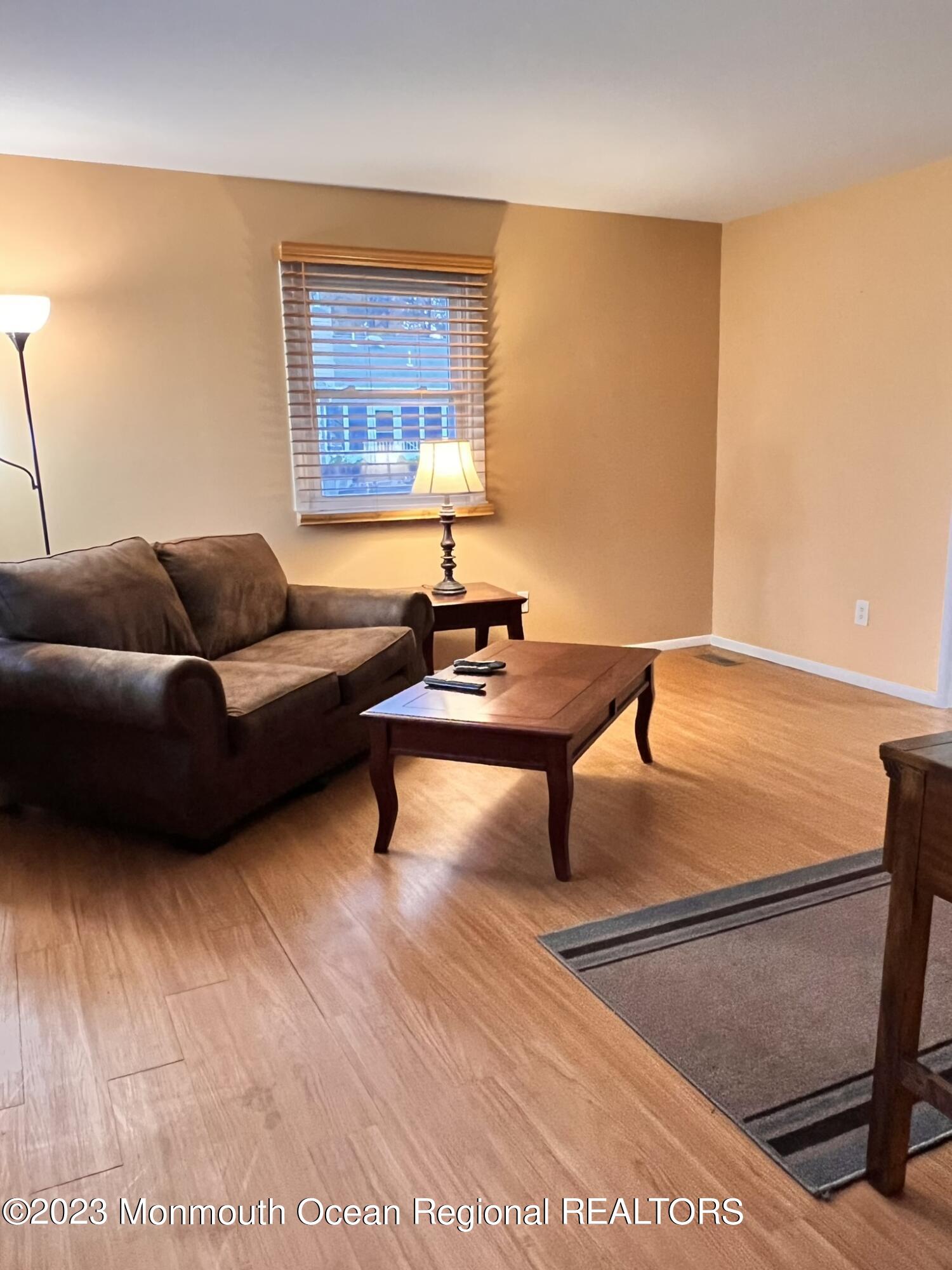 515 Eastern Boulevard Bayville, NJ 08721 - Photo 4 of 38 a living room with furniture and a window