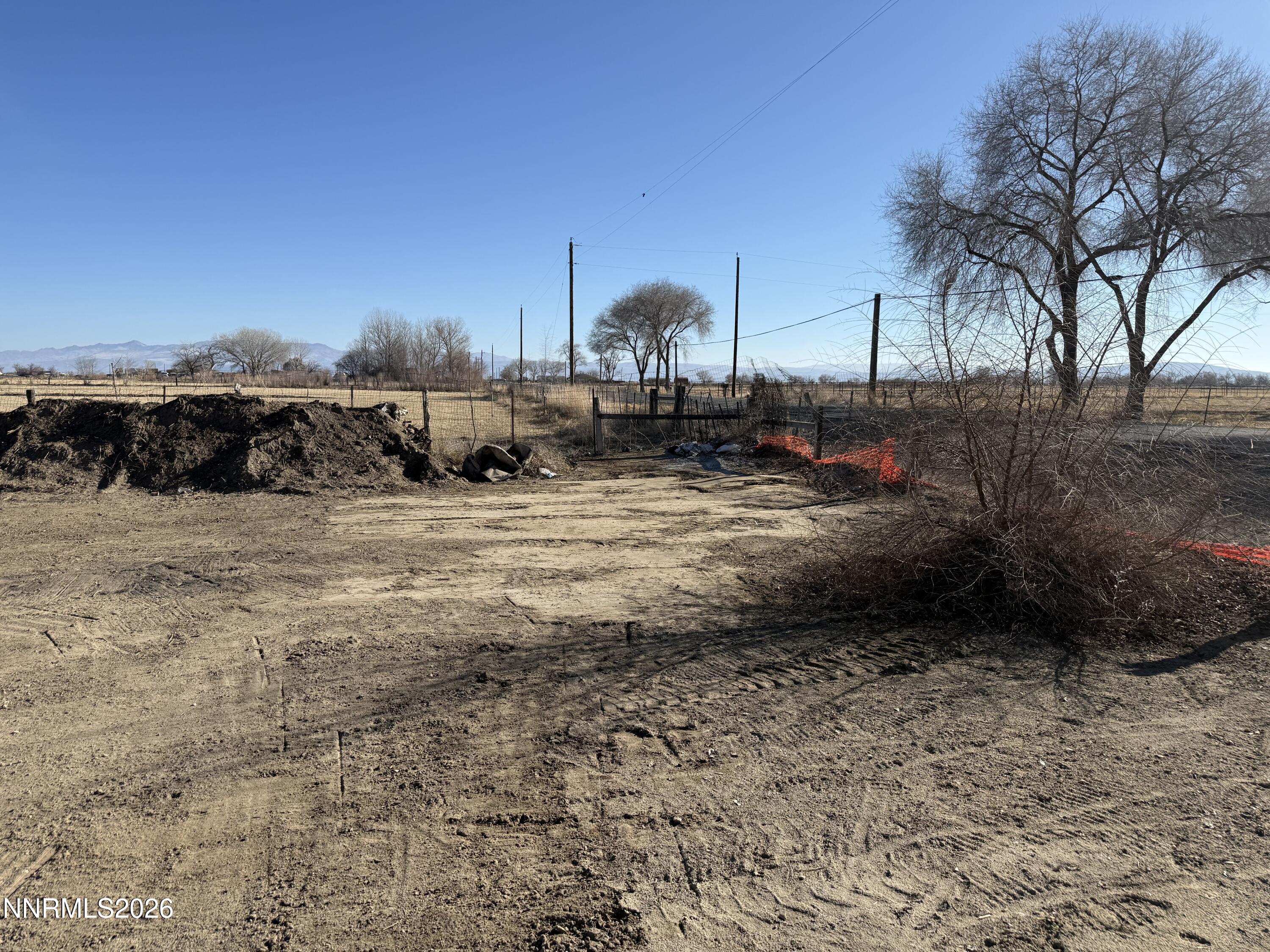 5525 Stillwater Road Fallon, NV 89406 - Photo 2 of 2 a view of a yard with a table and chairs