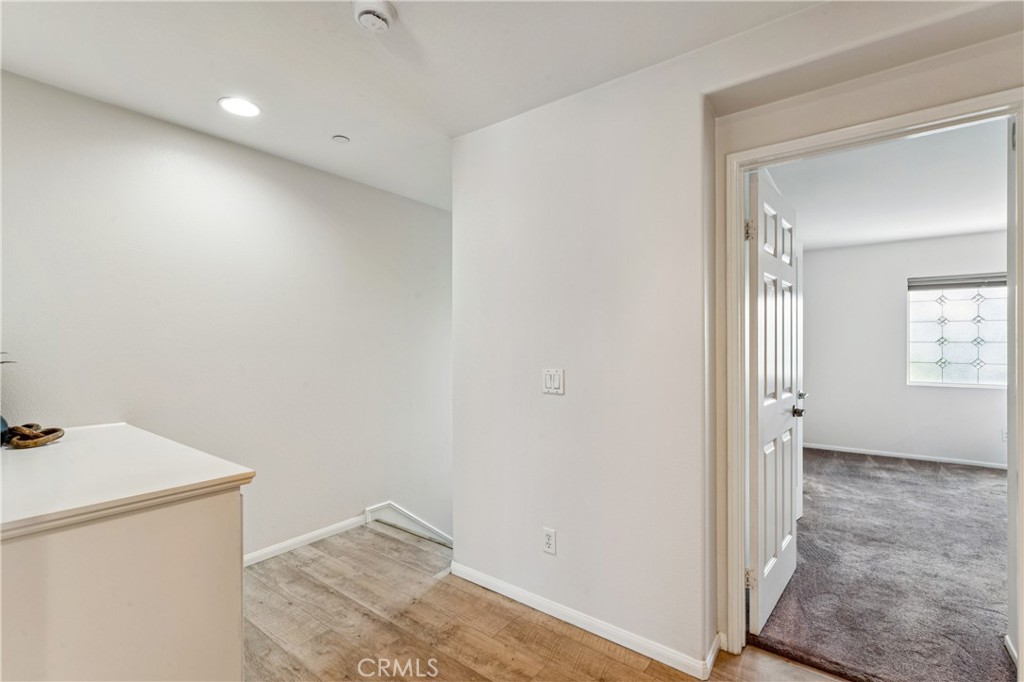 8048 Tulsa Place, Unit 105 Rancho Cucamonga, CA 91730 - Photo 18 of 45 a view of hallway with window
