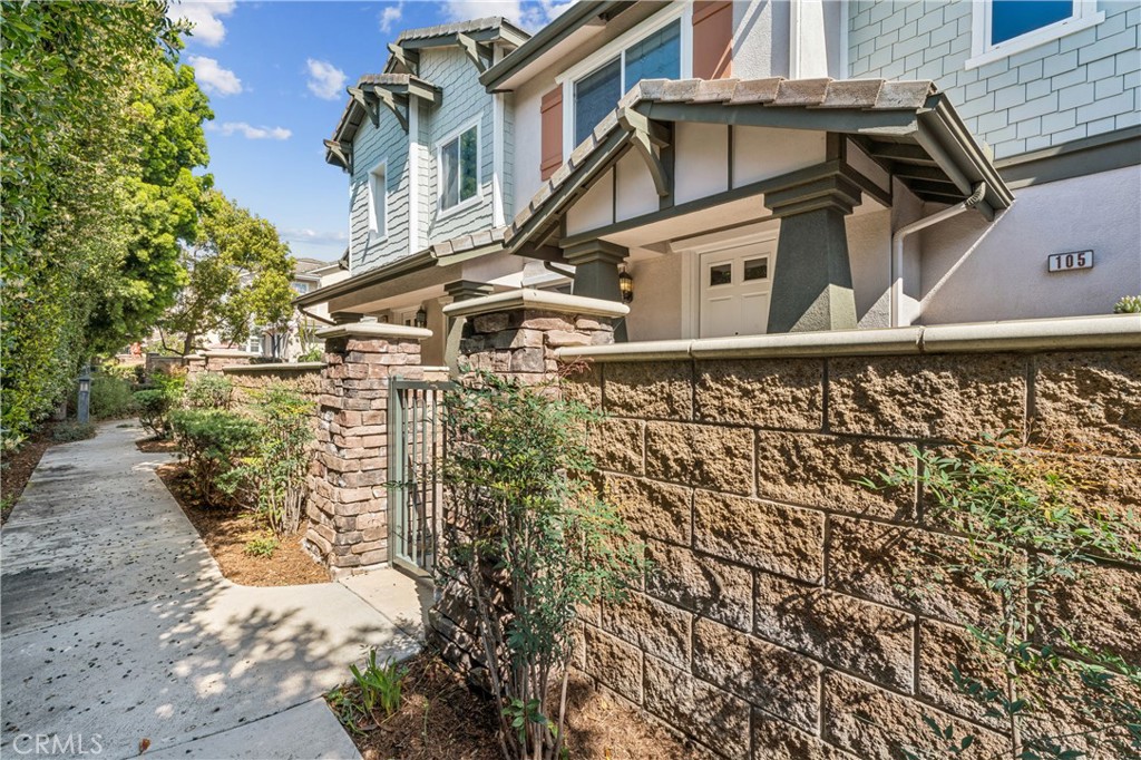 8048 Tulsa Place, Unit 105 Rancho Cucamonga, CA 91730 - Photo 32 of 45 a view of a building with a street