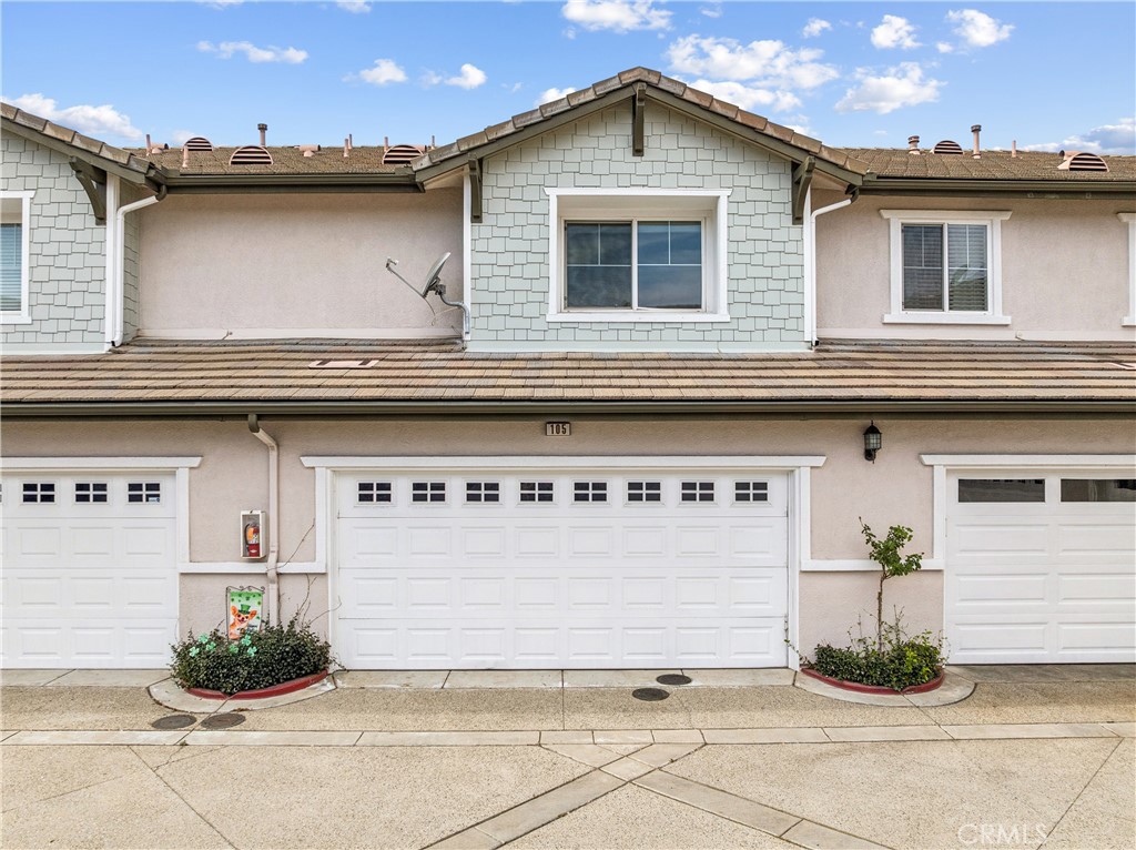 8048 Tulsa Place, Unit 105 Rancho Cucamonga, CA 91730 - Photo 35 of 45 a front view of a house