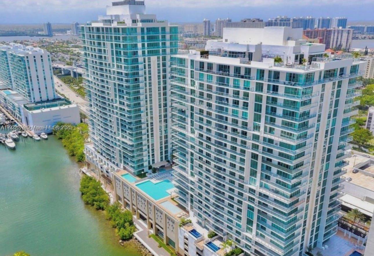 330 Sunny Isles Boulevard, Unit 52002 Sunny Isles Beach, FL 33160 - Photo 2 of 56 a view of a city with tall buildings
