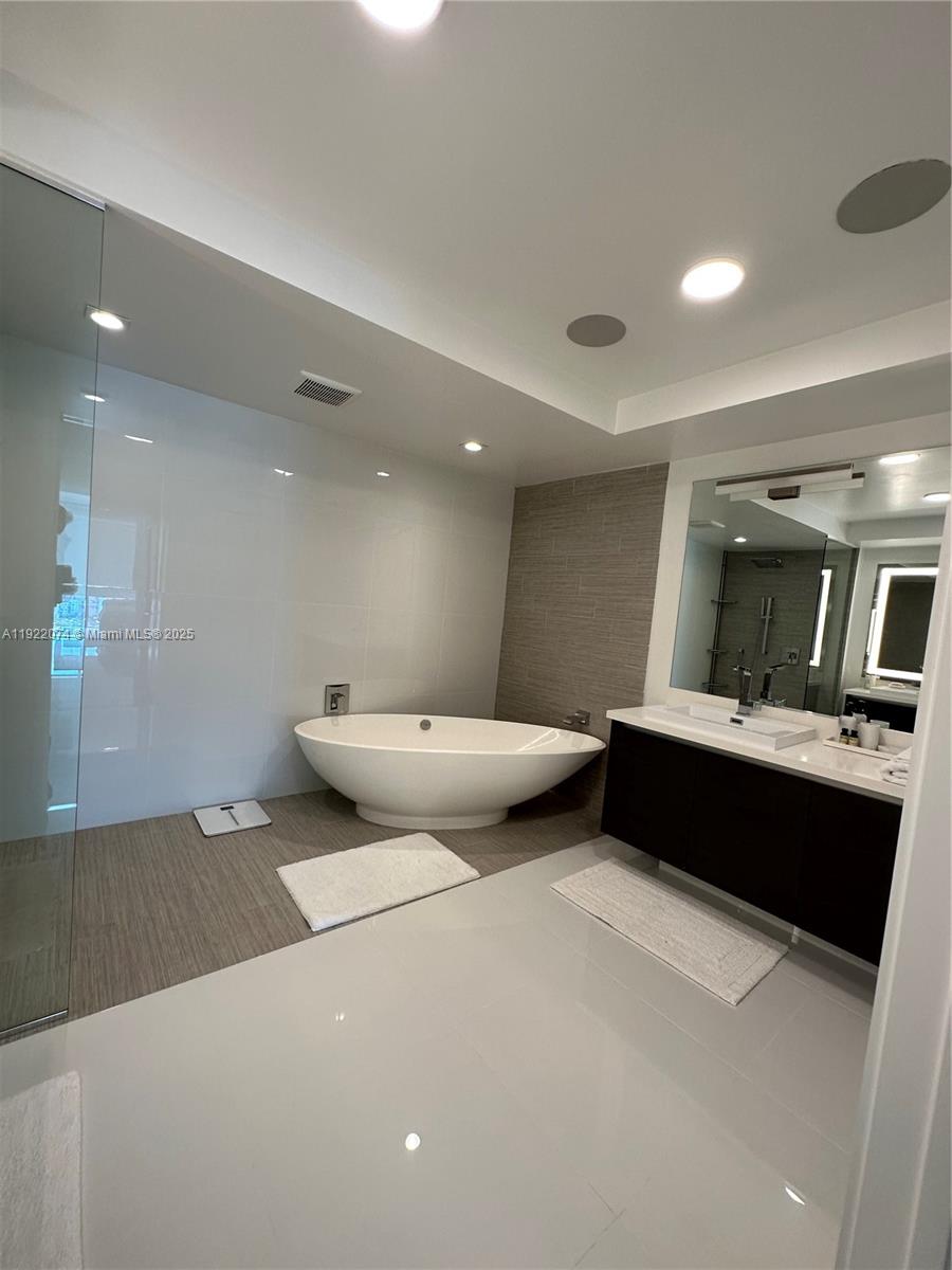 330 Sunny Isles Boulevard, Unit 52002 Sunny Isles Beach, FL 33160 - Photo 50 of 56 a living room with furniture