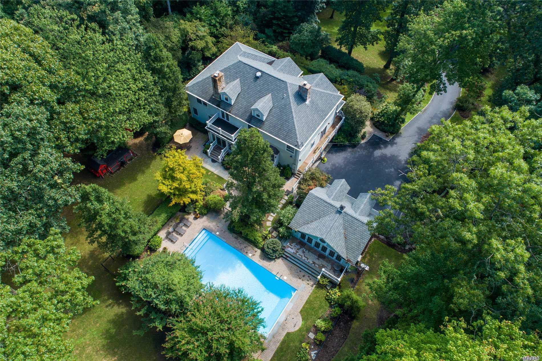 an aerial view of a house with a garden
