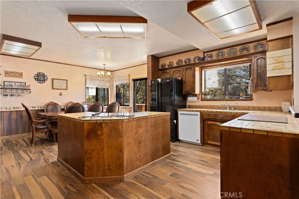 340 Fritch Road Lakeport, CA 95453 - Photo 13 of 65 a view of a kitchen with furniture and wooden floor