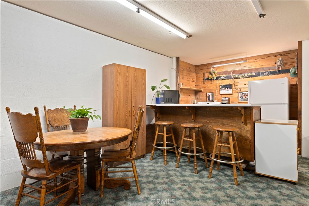 340 Fritch Road Lakeport, CA 95453 - Photo 24 of 65 a dining room with furniture and a window