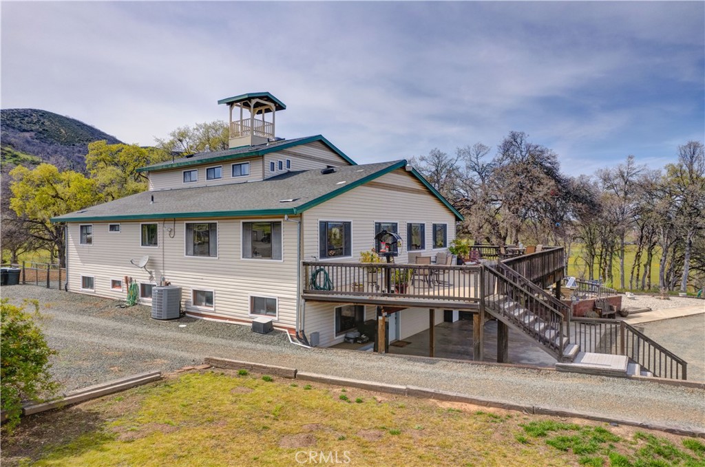 340 Fritch Road Lakeport, CA 95453 - Photo 3 of 65 a view of a house with swimming pool and sitting area