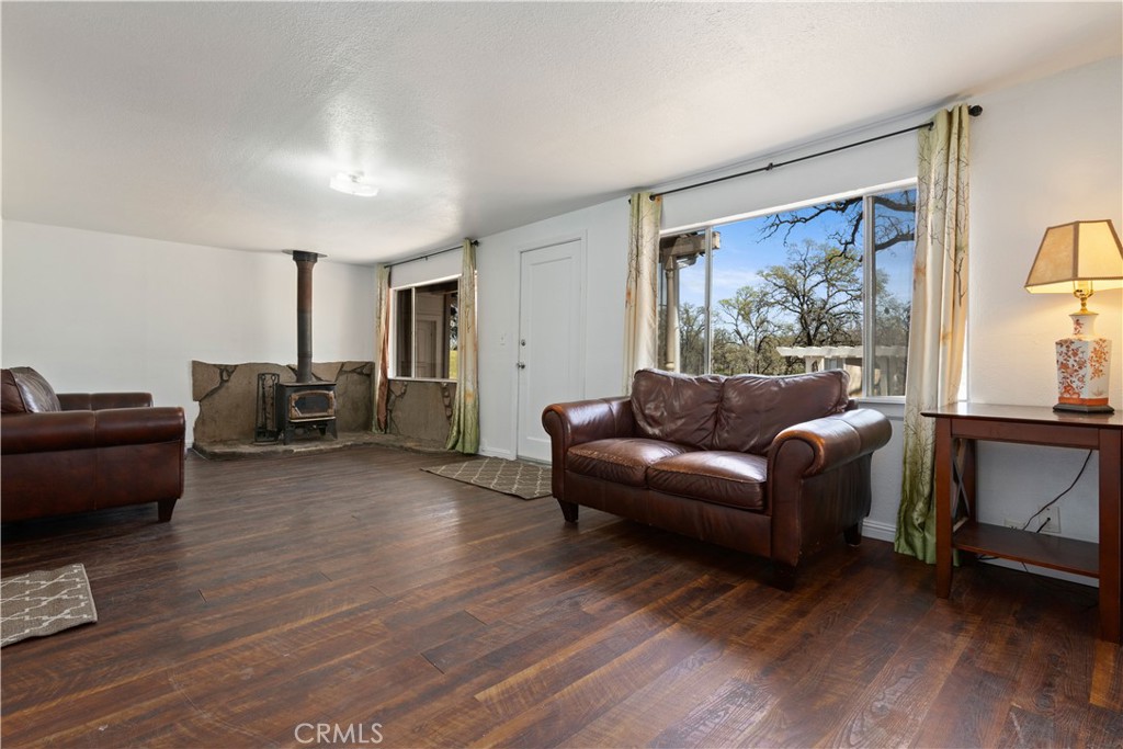 340 Fritch Road Lakeport, CA 95453 - Photo 33 of 65 a living room with furniture and a large window