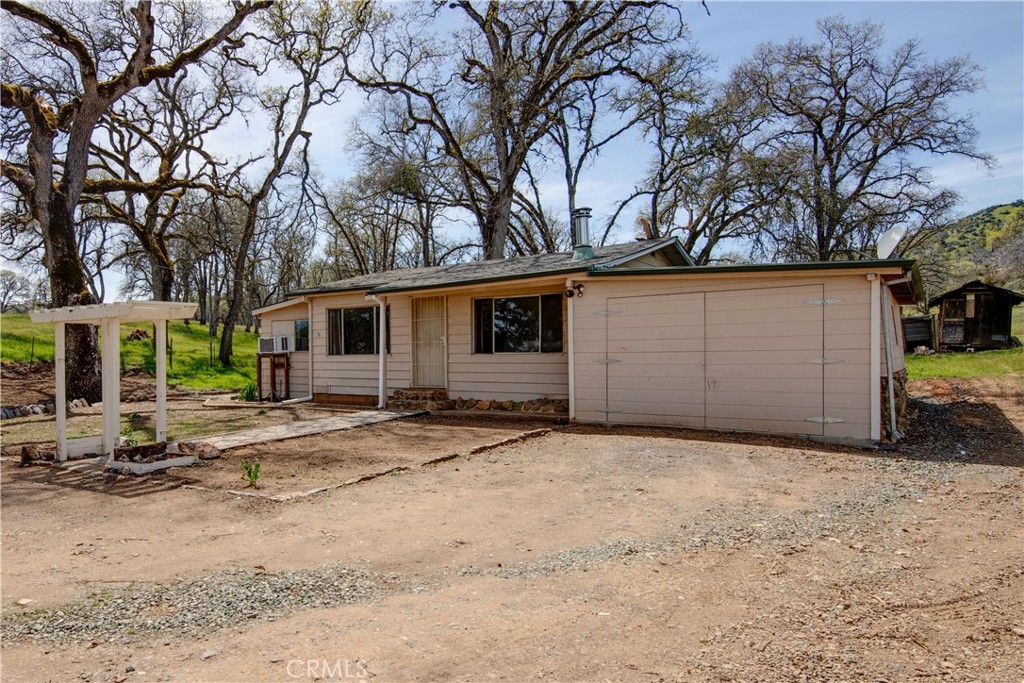 340 Fritch Road Lakeport, CA 95453 - Photo 33 of 65 a view of a house with a patio