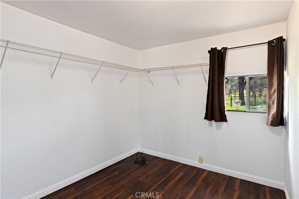 340 Fritch Road Lakeport, CA 95453 - Photo 38 of 65 a view of a room with wooden floor and small window