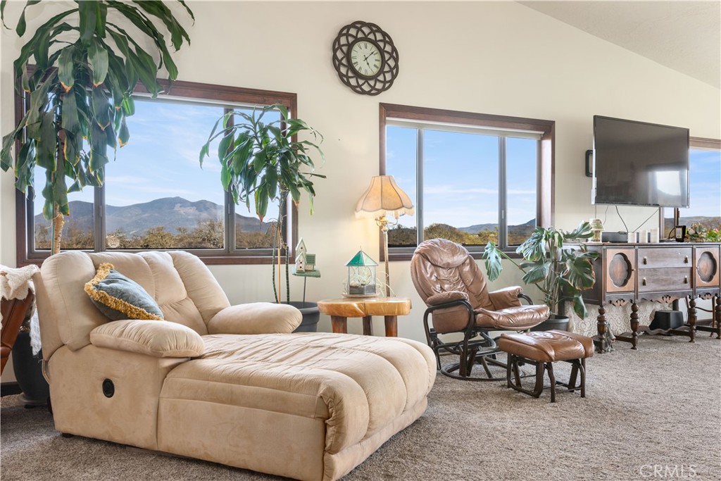 340 Fritch Road Lakeport, CA 95453 - Photo 7 of 65 a living room with furniture and a large window