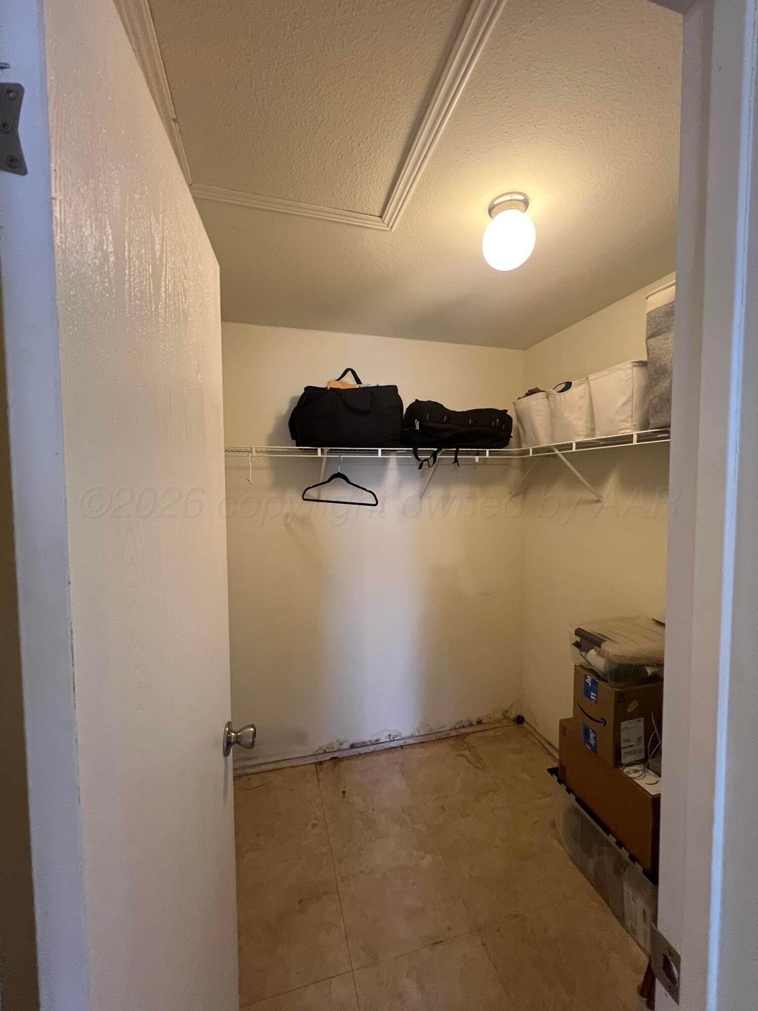 707 Conklin Street Canadian, TX 79014 - Photo 22 of 38 a view of a room with storage and utility