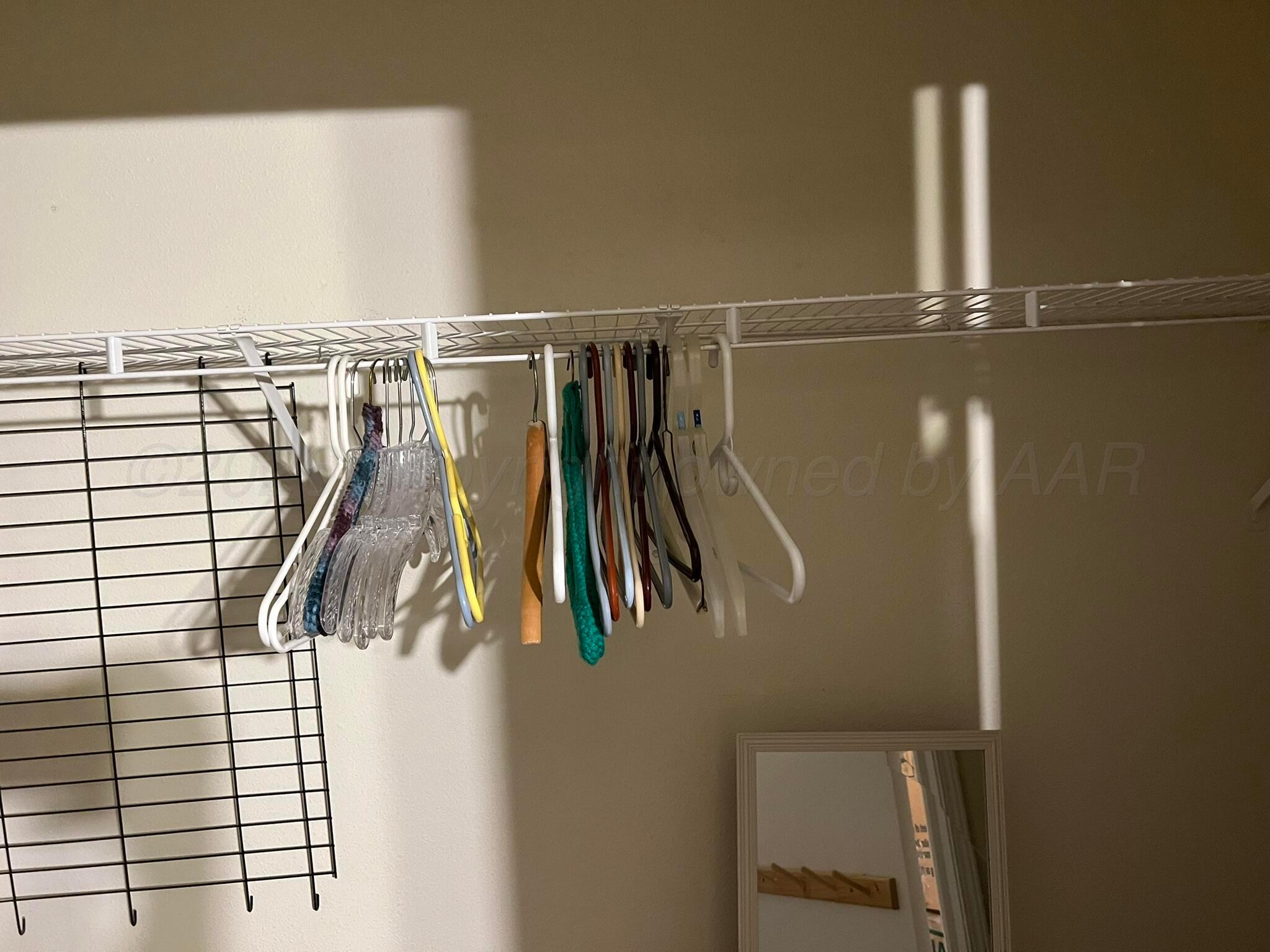 707 Conklin Street Canadian, TX 79014 - Photo 28 of 38 a view of walk in closet with clothes and shoes
