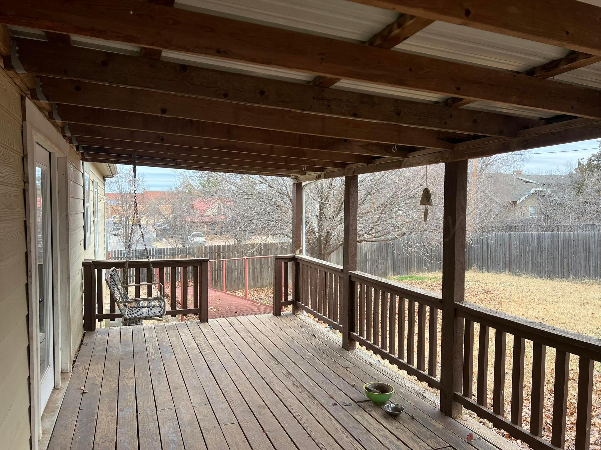 707 Conklin Street Canadian, TX 79014 - Photo 29 of 38 a view of a balcony with furniture and wooden floor
