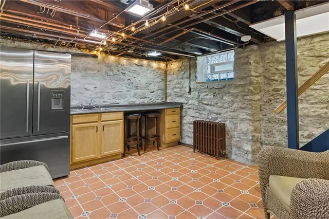 a view of a room with wooden walls