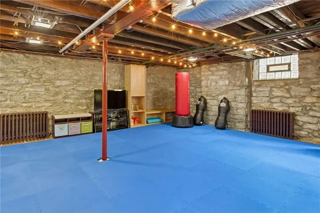 a outdoor living space with patio furniture and a wooden door