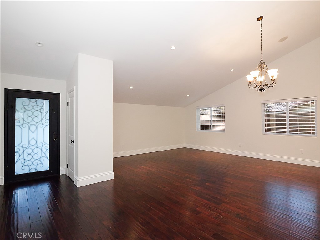 32 Silver Spring Drive Rolling Hills Estates, CA 90274 - Photo 2 of 24 a view of an empty room with wooden floor and windows