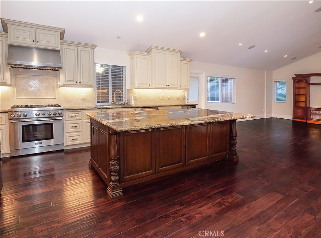 32 Silver Spring Drive Rolling Hills Estates, CA 90274 - Photo 5 of 24 a kitchen with stainless steel appliances granite countertop a stove a sink and a refrigerator