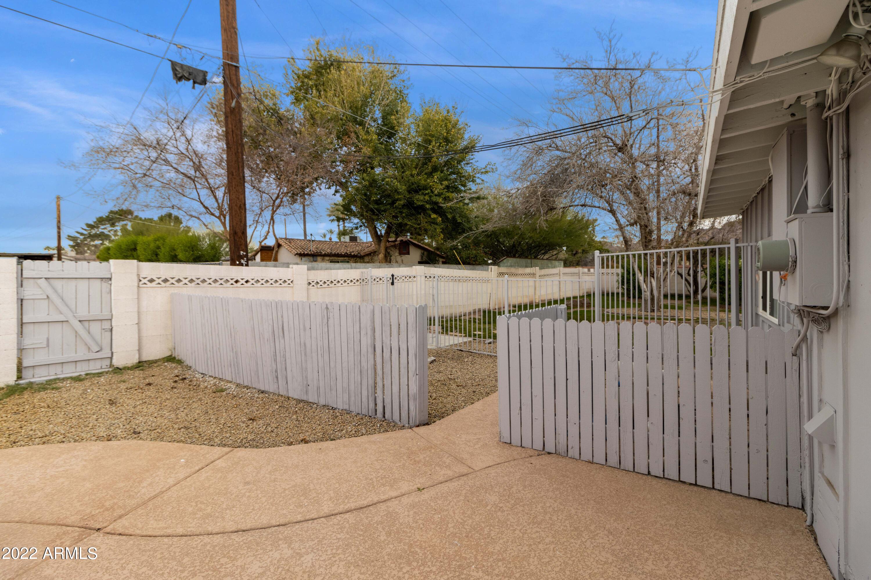 3660 North 52nd Street Phoenix, AZ 85018 - Photo 13 of 37 Entry to Back Sideyard
