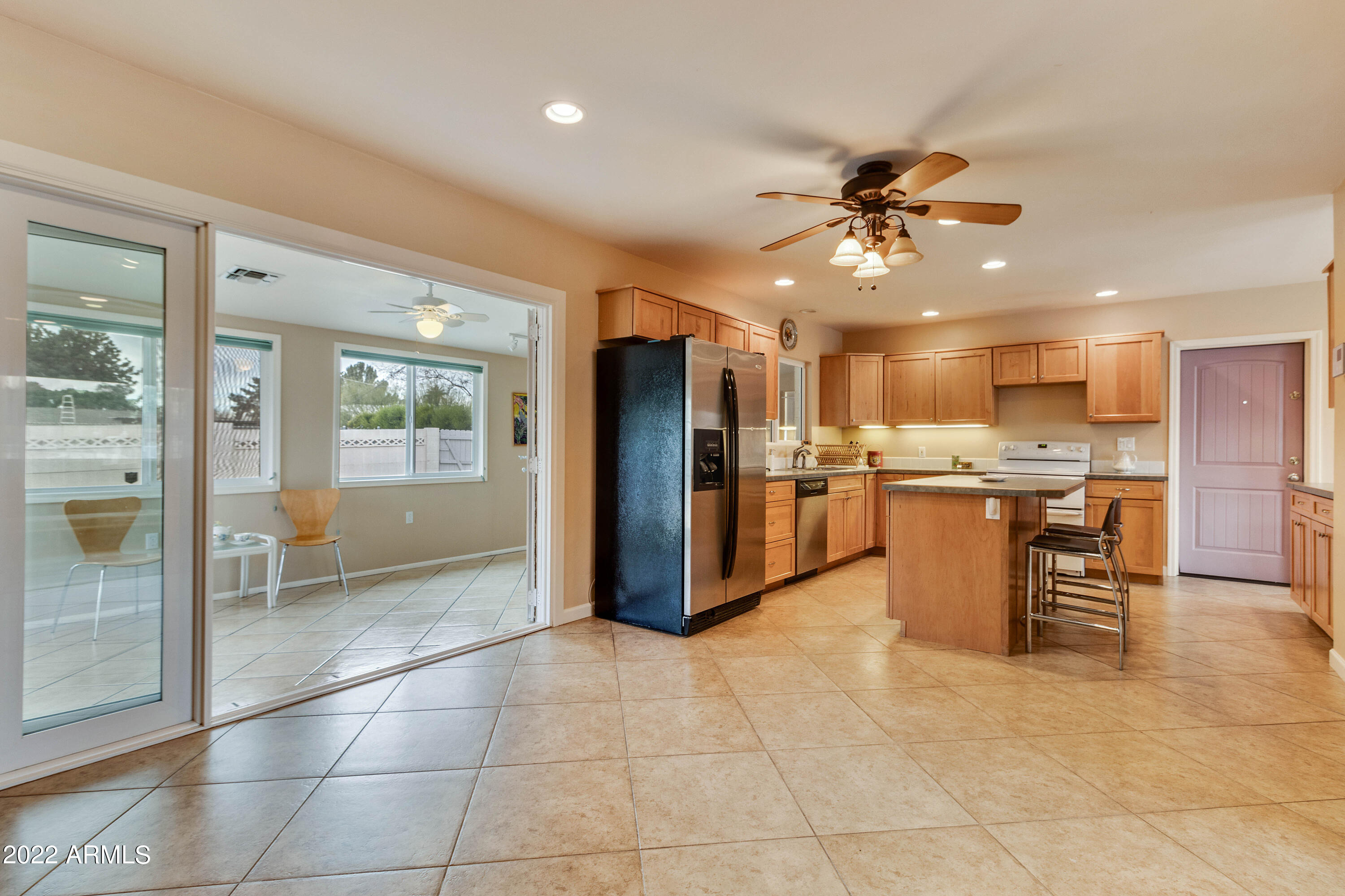 3660 North 52nd Street Phoenix, AZ 85018 - Photo 28 of 37 Family Room to Arizona Room