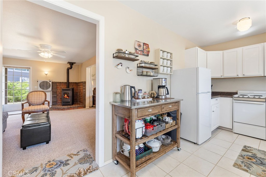 60206 Devils Ladder Road Mountain Center, CA 92561 - Photo 30 of 56 a living room with furniture and a window