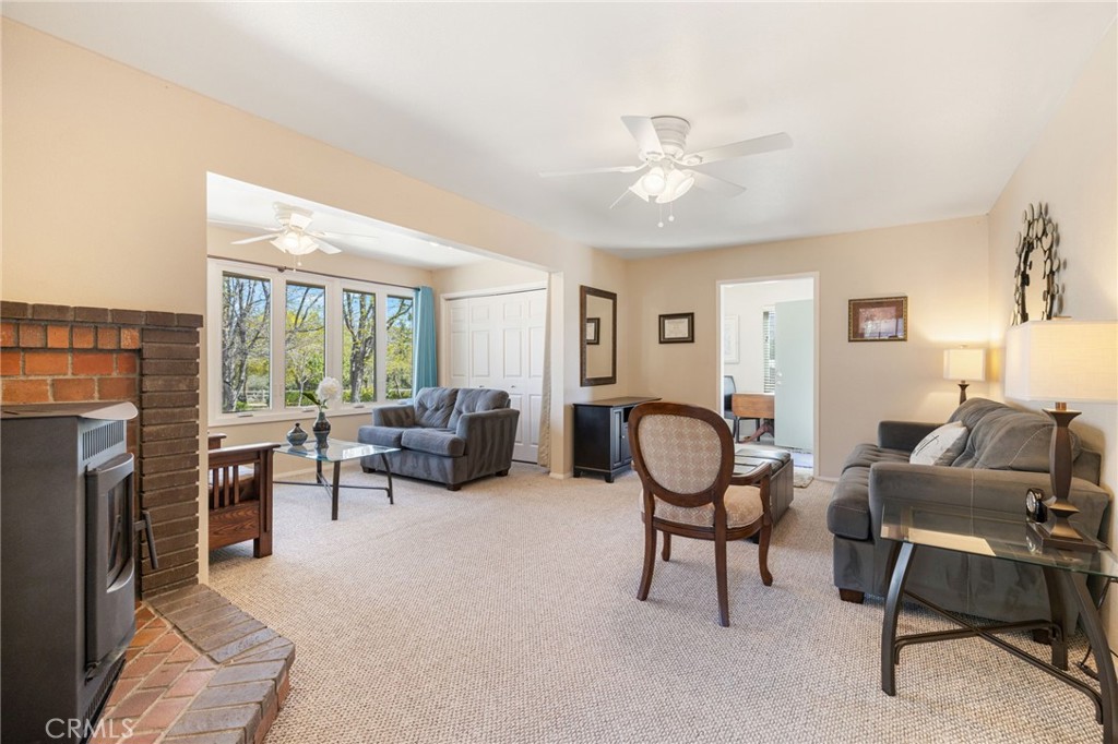 60206 Devils Ladder Road Mountain Center, CA 92561 - Photo 32 of 56 a living room with furniture and a fireplace