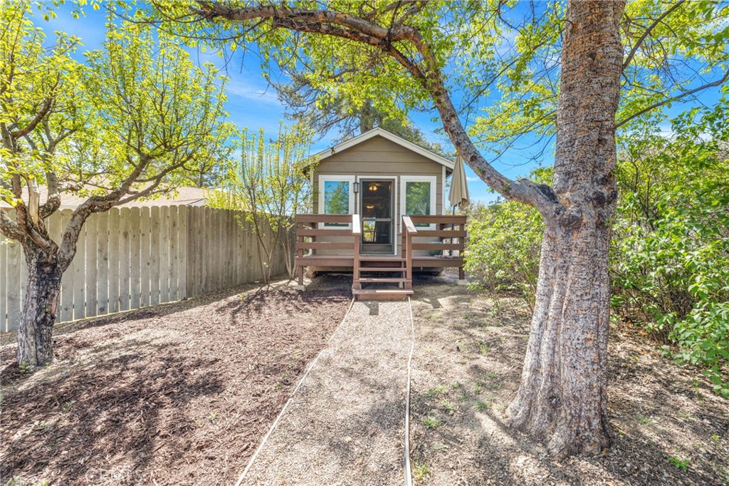 60206 Devils Ladder Road Mountain Center, CA 92561 - Photo 35 of 56 a front view of a house with garden