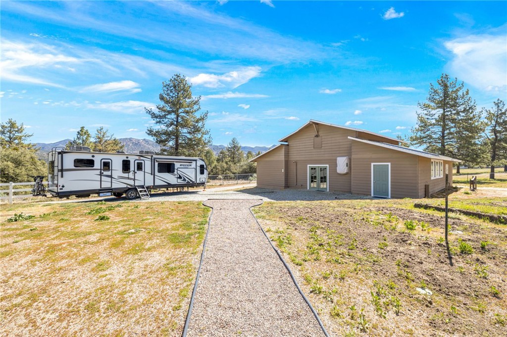 60206 Devils Ladder Road Mountain Center, CA 92561 - Photo 38 of 56 a house view with swimming pool in front of it