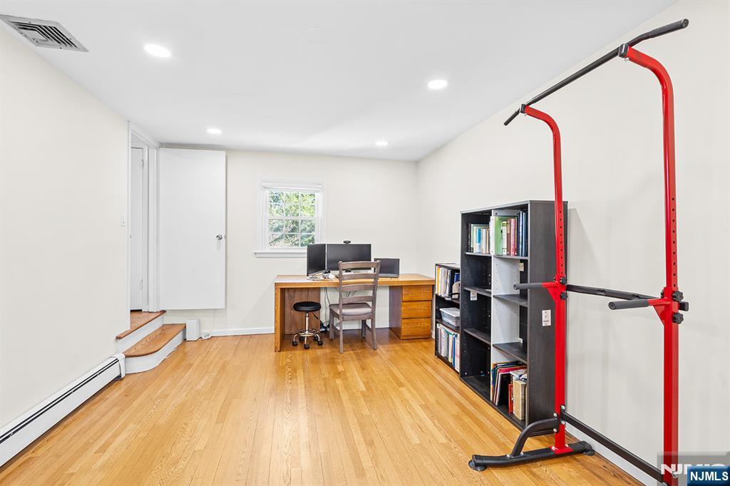 82 Van Horn Street Demarest, NJ 07627 - Photo 12 of 31 a view of a room with gym equipment