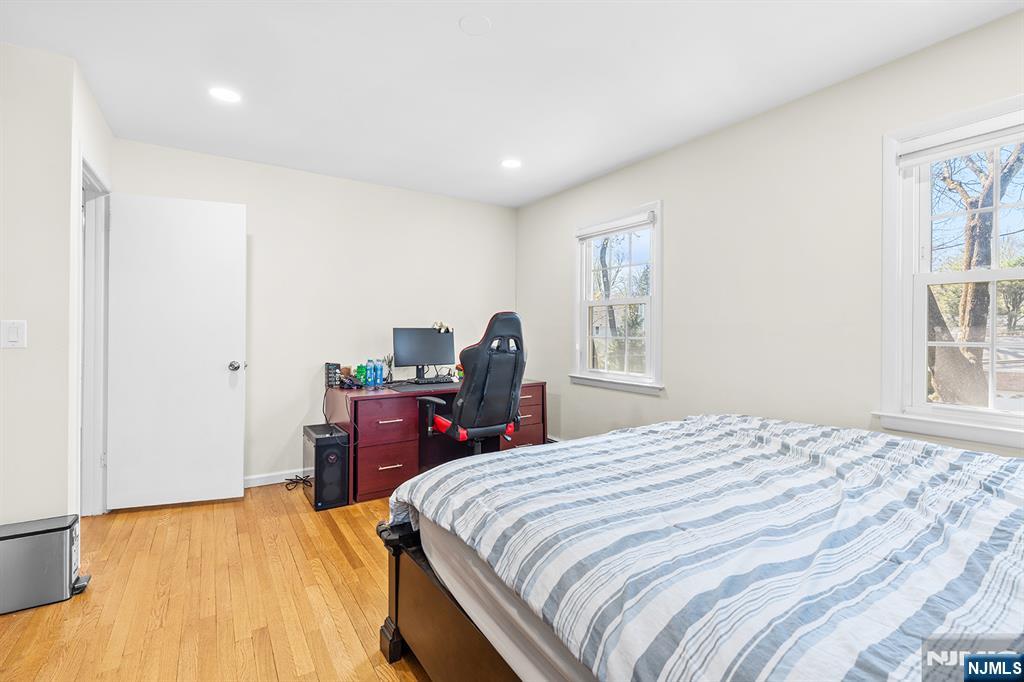 82 Van Horn Street Demarest, NJ 07627 - Photo 17 of 31 a bed room with a bed and a dresser
