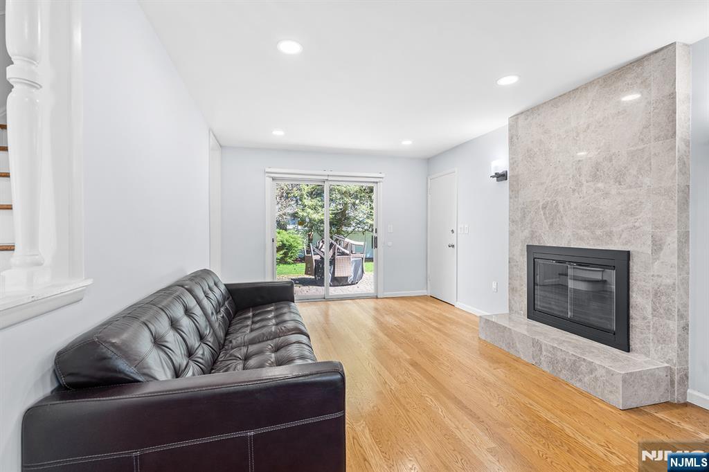 82 Van Horn Street Demarest, NJ 07627 - Photo 3 of 31 a living room with furniture and a fireplace