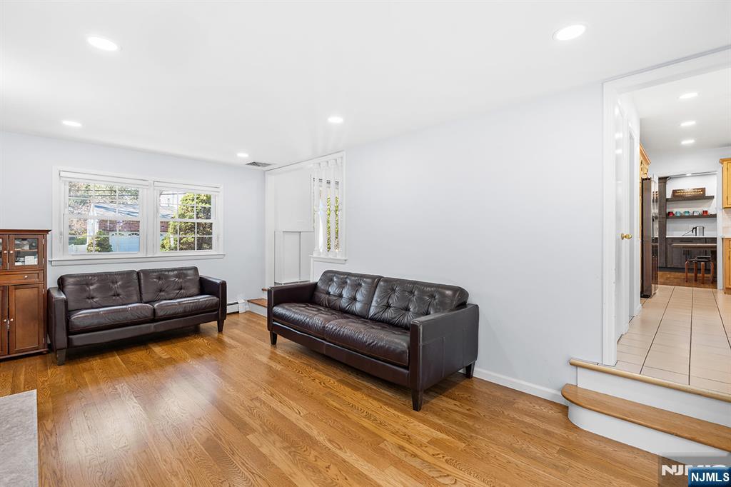 82 Van Horn Street Demarest, NJ 07627 - Photo 4 of 31 a living room with furniture and a couch