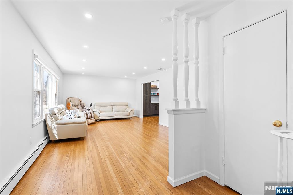 82 Van Horn Street Demarest, NJ 07627 - Photo 7 of 31 a living room with furniture and a wooden floor