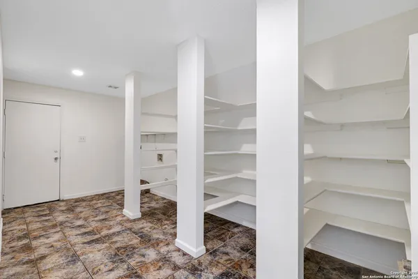 a view of a room with rack on the wall