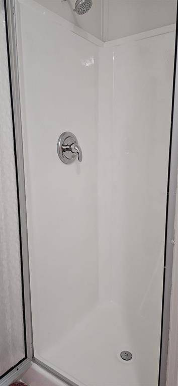 3636 South Lazy Lake Drive Lakeland, FL 33801 - Photo 16 of 28 a bathroom with a shower