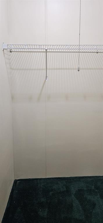 3636 South Lazy Lake Drive Lakeland, FL 33801 - Photo 21 of 28 a view of a room with racks on the wall