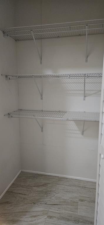 3636 South Lazy Lake Drive Lakeland, FL 33801 - Photo 23 of 28 a view of a room with racks on the wall