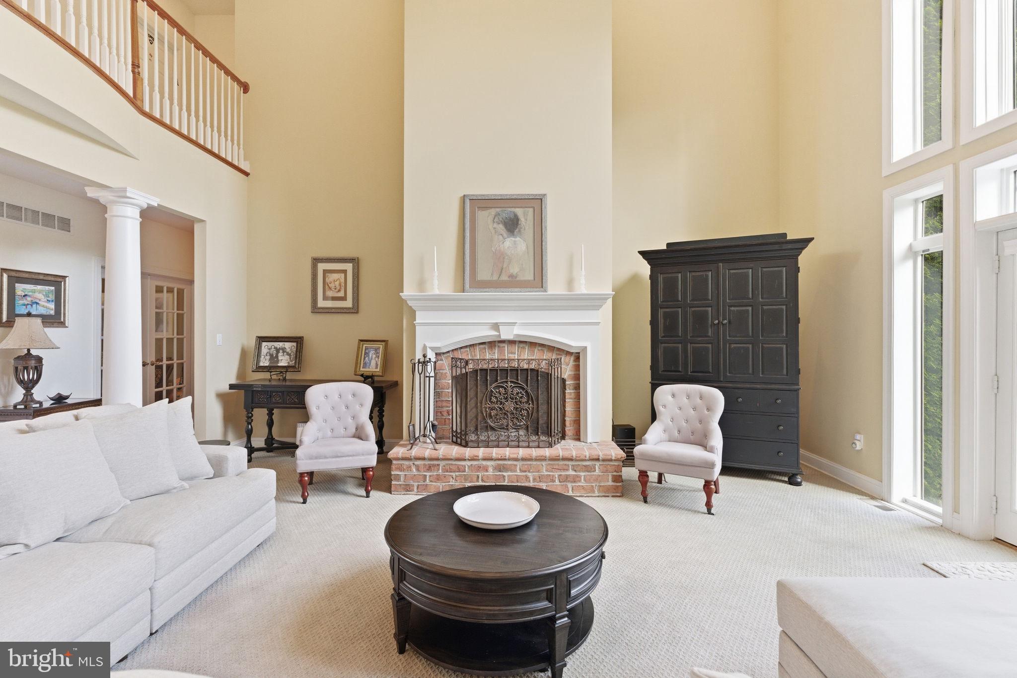 9 Deer Ridge Court Phoenix, MD 21131 - Photo 20 of 96 a living room with furniture and a fireplace