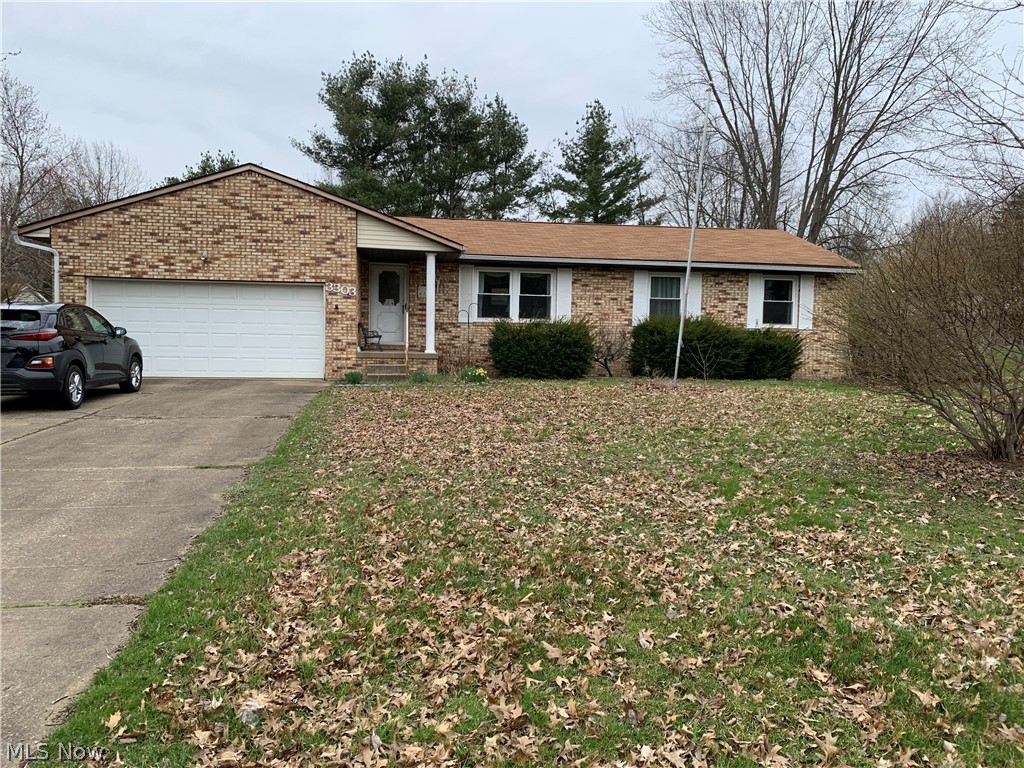 3303 Wright Road Northwest Uniontown, OH 44685 - Photo 1 of 10 Front Outside View - 3303 Wright Rd NW