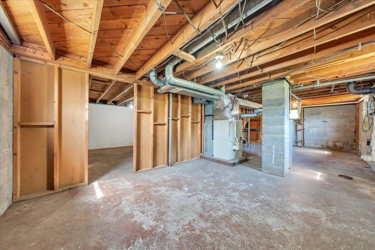 201 Long Avenue Covington, VA 24426 - Photo 21 of 43 a view of empty room with wooden walls