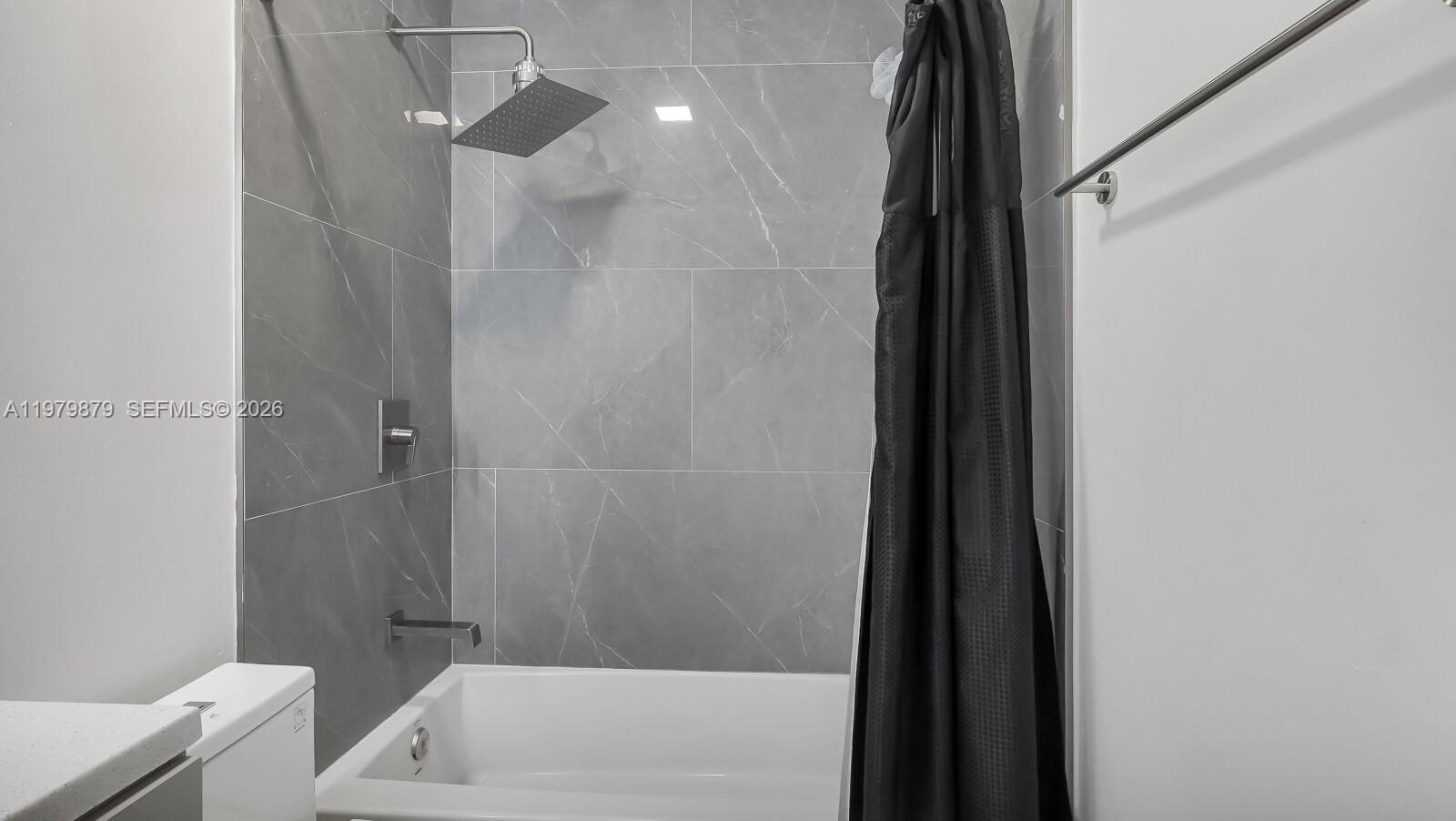 3251 Inverrary Boulevard West Lauderhill, FL 33319 - Photo 31 of 45 Shower with rainfall shower head