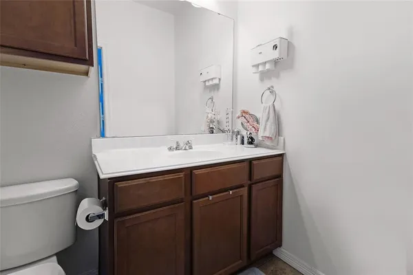 a bathroom with a sink and a toilet