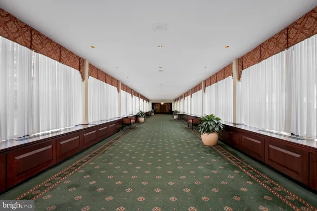 a view of two chairs in the balcony