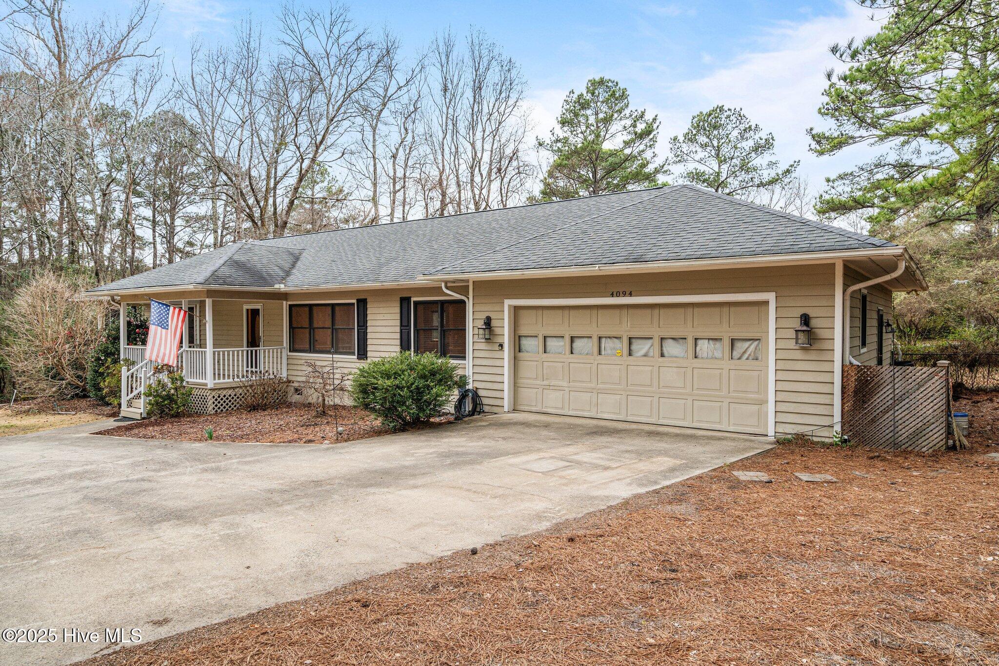 4094 Niagara Carthage Road Whispering Pines, NC 28327 - Photo 5 of 57 Right side view of home.