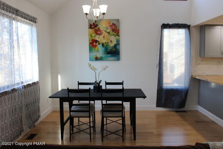 3318 Windermere Drive Bushkill, PA 18324 - Photo 8 of 35 a view of a dining room with furniture and window