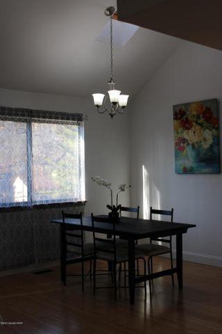 3318 Windermere Drive Bushkill, PA 18324 - Photo 9 of 35 a dining room with furniture and window