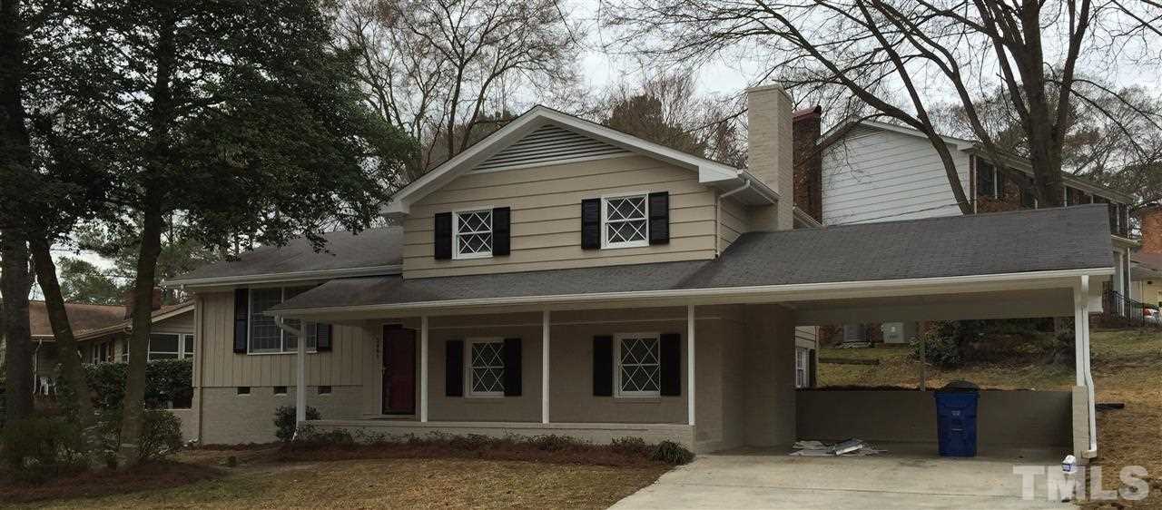 909 Hardimont Road Raleigh, NC 27609 - Photo 2 of 9 a front view of a house with garage