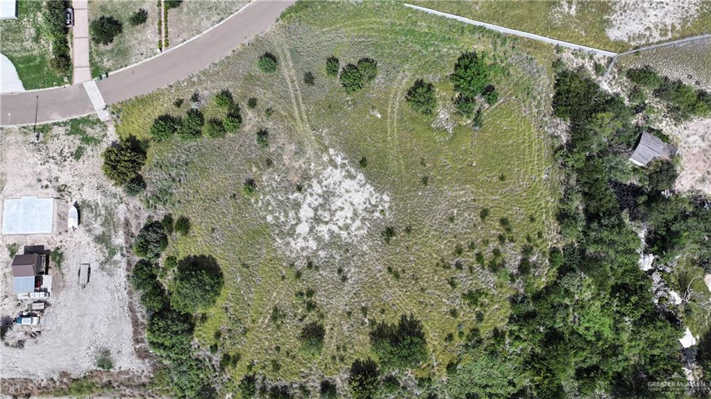 109 Sunset Lane Rio Grande City, TX 78582 - Photo 3 of 6 a view of a garden with a building