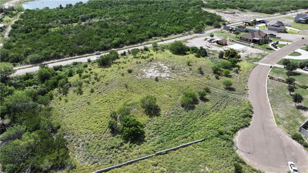 109 Sunset Lane Rio Grande City, TX 78582 - Photo 5 of 6 an aerial view of a house with a yard