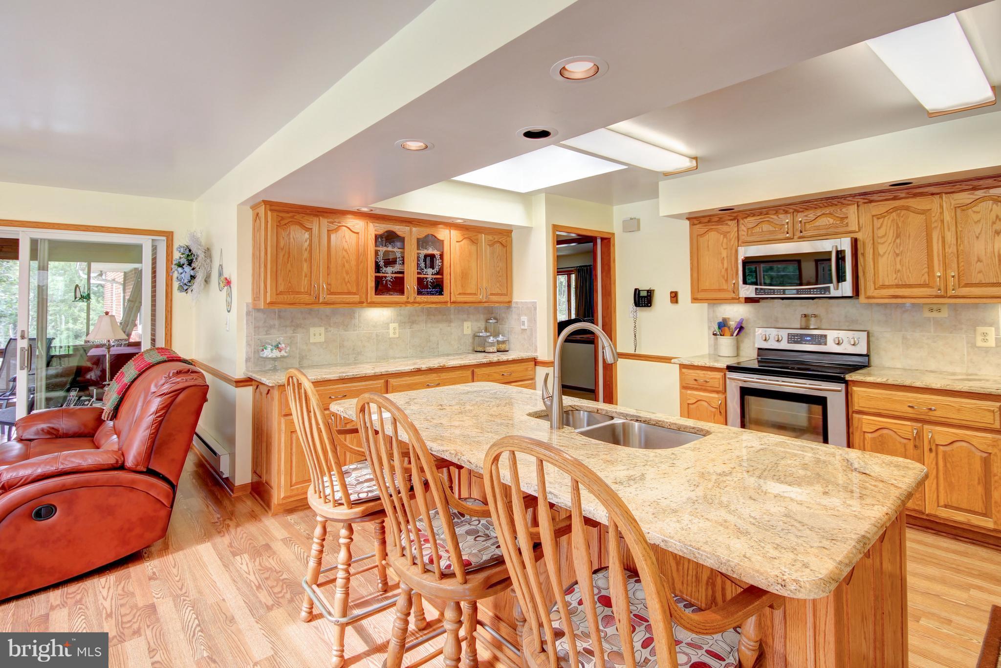 5302 Wendy Road Sykesville, MD 21784 - Photo 2 of 30 Pergo, granite, skylights w/power shades